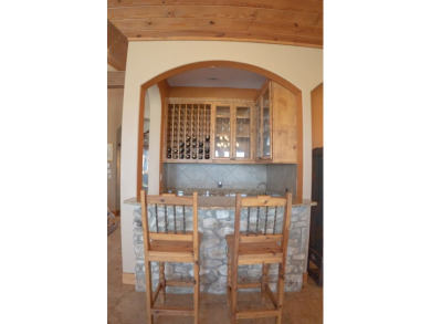 Stunning custom home on gorgeous 35.04 acres (per plat) within