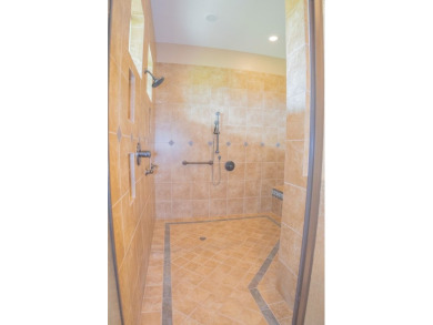 Stunning custom home on gorgeous 35.04 acres (per plat) within