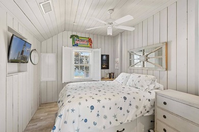 This rare, charming beachfront escape feels like you are on the - photo 11