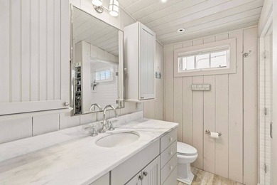 This rare, charming beachfront escape feels like you are on the - photo 12