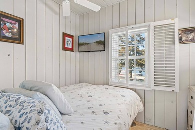 This rare, charming beachfront escape feels like you are on the - photo 13