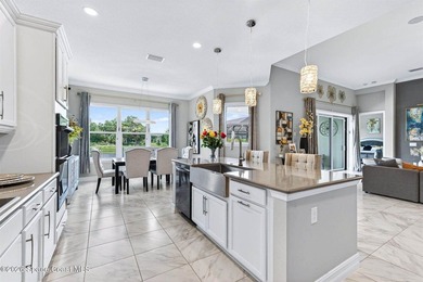 Stunning Executive Pool Home located in the gated community of - photo 7