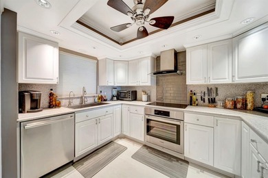 Live the coastal lifestyle in this updated 2BR/2BA corner unit