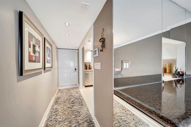 Live the coastal lifestyle in this updated 2BR/2BA corner unit