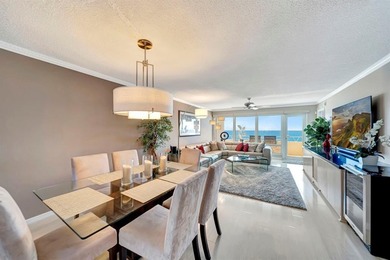 Live the coastal lifestyle in this updated 2BR/2BA corner unit