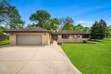 WELCOME TO THIS SOLID ALL BRICK SPRAWLING RANCH ON A LARGE - photo 1