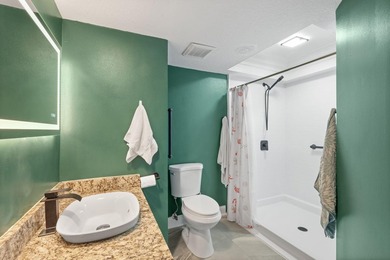 ABSOLUTELY GORGEOUS WATERFRONT CONDO | FIRST FLOOR UNIT | HIGHLY - photo 14