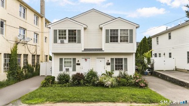 Rare Greenwich opportunity! This side-by-side duplex at 9 - photo 1