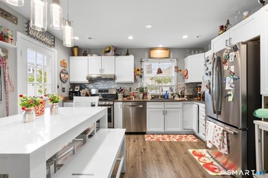 Rare Greenwich opportunity! This side-by-side duplex at 9 - photo 7