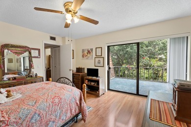 Nestled in a beautiful garden setting overlooking the lake & - photo 14