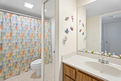 Nestled in a beautiful garden setting overlooking the lake & - photo 21