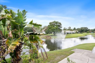 Nestled in a beautiful garden setting overlooking the lake & - photo 22