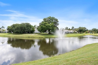 Nestled in a beautiful garden setting overlooking the lake & - photo 24