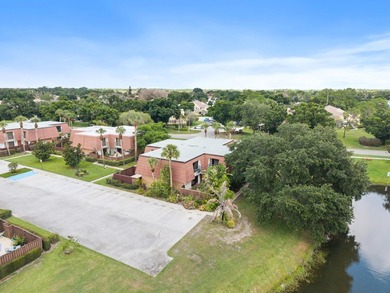 Nestled in a beautiful garden setting overlooking the lake & - photo 27