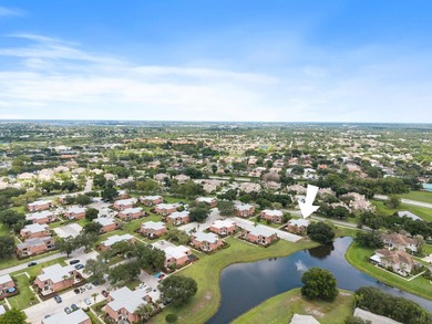 Nestled in a beautiful garden setting overlooking the lake & - photo 29