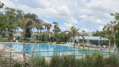 Nestled in a beautiful garden setting overlooking the lake & - photo 36