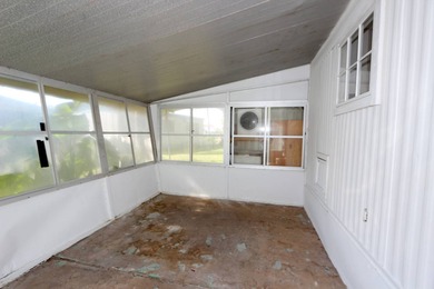 Adorable updated 2-bedroom 1-bath manufactured home nestled in a - photo 12