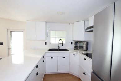 Adorable updated 2-bedroom 1-bath manufactured home nestled in a - photo 22