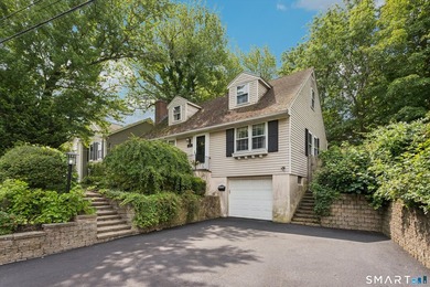 Charming 4-bedroom, 2-full-bath cape offering the perfect blend - photo 1