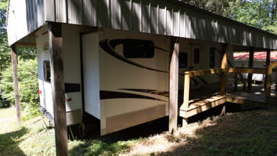 Waterfront Lot, Camper, Electric, Water & Septic Connected - photo 11