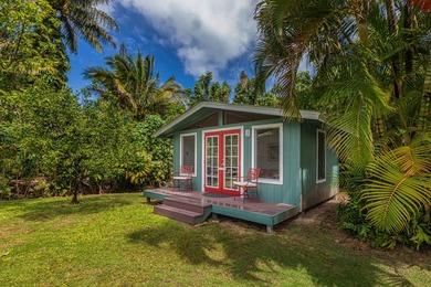 This Enchanting 2 bedroom flag lot Cottage situated on a lush - photo 22