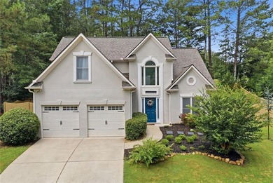 Tucked away on a private corner lot, you'll immediately notice - photo 1