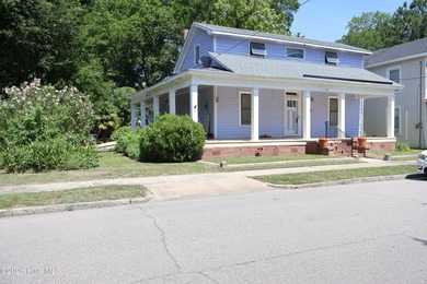 Welcome to this charming 3-bedroom, 2-bath historic home - photo 2