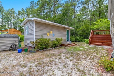 Welcome to peaceful living in Boiling Spring Lakes! This freshly - photo 42