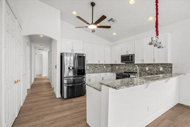 Welcome to this stunning remodeled 4-bedroom, 2.5-bathroom - photo 29