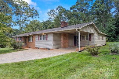 Well-maintained home on a spacious 3.28 acre corner lot in the