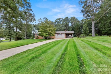 Well-maintained home on a spacious 3.28 acre corner lot in the