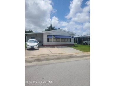 This 2-bedroom 2-bathroom home is a great opportunity for an - photo 1