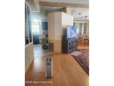 This 2-bedroom 2-bathroom home is a great opportunity for an - photo 6