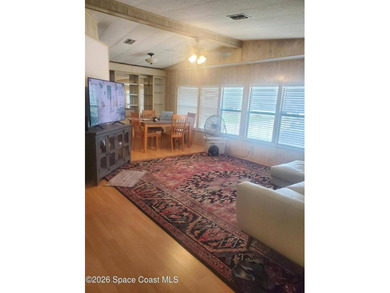 This 2-bedroom 2-bathroom home is a great opportunity for an - photo 7