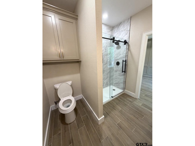 BRAND NEW BUILDER CUSTOM LOCATED ON PEACEFUL PRIVATE STREET WITH - photo 15