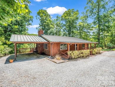Tucked among the trees in the desirable Riverbend community of - photo 2