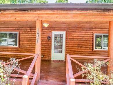 Tucked among the trees in the desirable Riverbend community of - photo 4