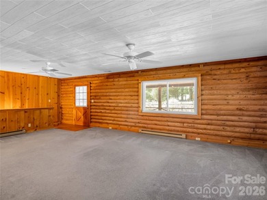 Tucked among the trees in the desirable Riverbend community of - photo 9