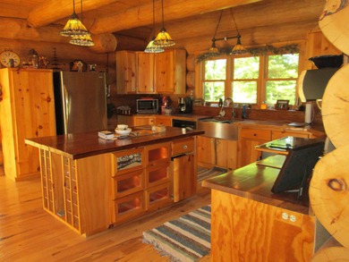 Is Golf your Game? This stunning full log home is perfect for - photo 15