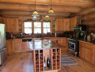Is Golf your Game? This stunning full log home is perfect for - photo 16