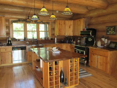 Is Golf your Game? This stunning full log home is perfect for - photo 17