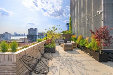 Introducing PHD, an extraordinary penthouse floating atop - photo 20