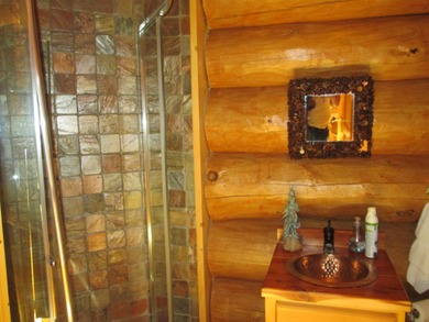 Is Golf your Game? This stunning full log home is perfect for - photo 20