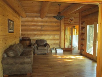Is Golf your Game? This stunning full log home is perfect for - photo 28