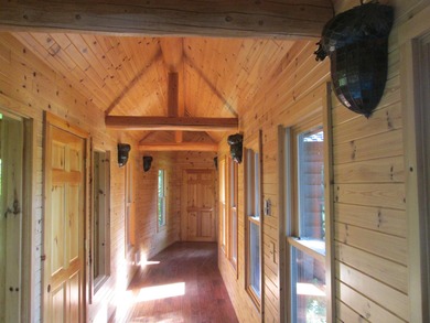 Is Golf your Game? This stunning full log home is perfect for - photo 29