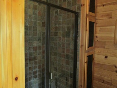 Is Golf your Game? This stunning full log home is perfect for - photo 30