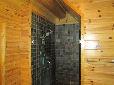Is Golf your Game? This stunning full log home is perfect for - photo 36