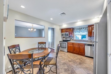 This Beautiful Well Maintained Home Perfectly Landscaped Front & - photo 4