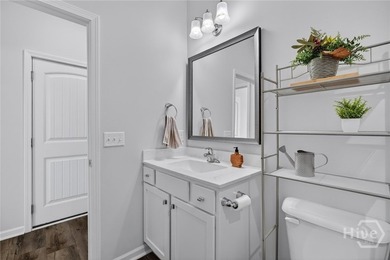 The Dayton is a spacious two story single family home in the - photo 11