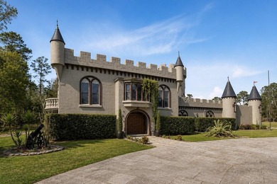 Set behind a gated entrance on 10 private acres in the sought - photo 1